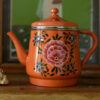 Beschilderde theepot